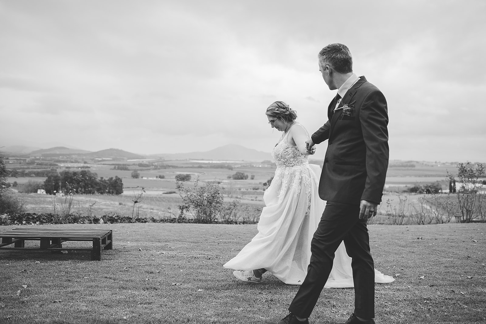 couple holding hands at diamant estate